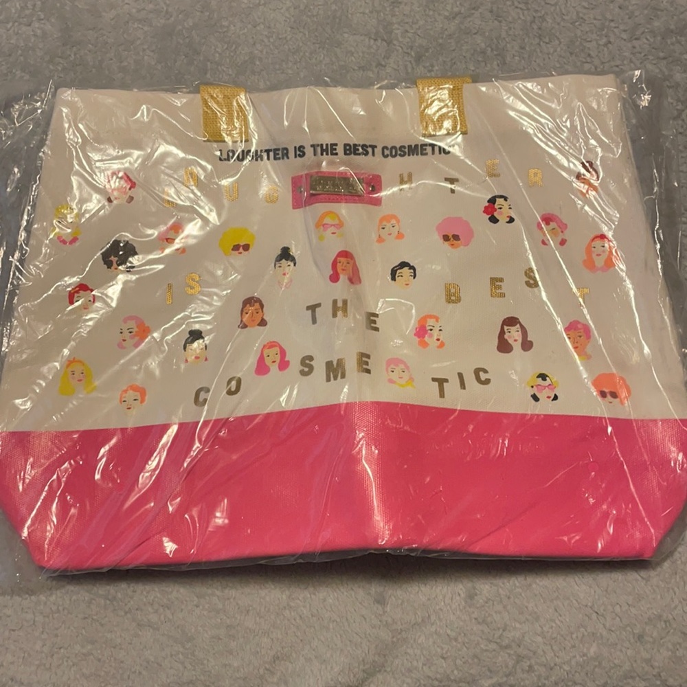 Benefit canvas bag with handles.